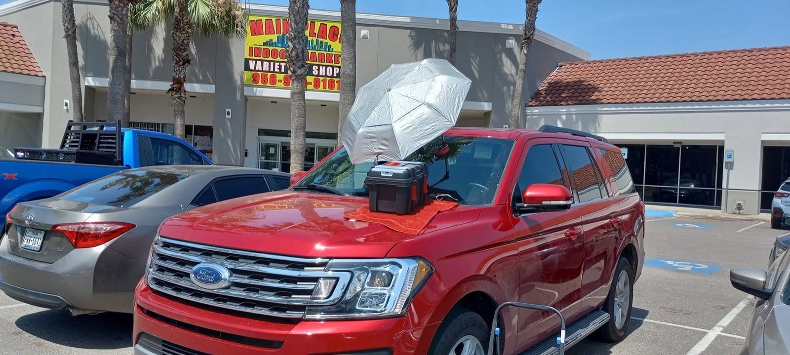 Premier Windshield mobile setup working on a white Cadillac in McAllen, Texas