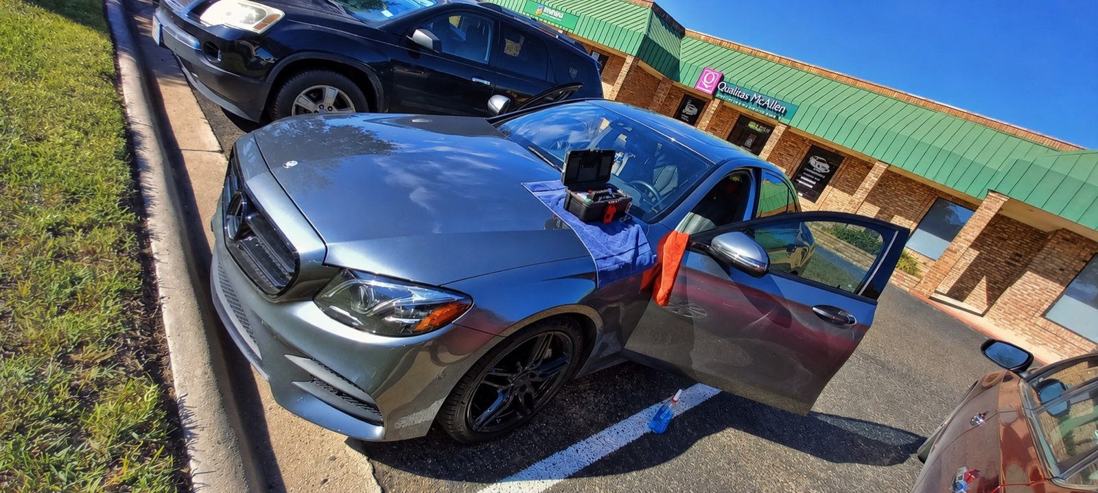Premier Windshield mobile setup working on a grey Mercedes in McAllen, Texas
