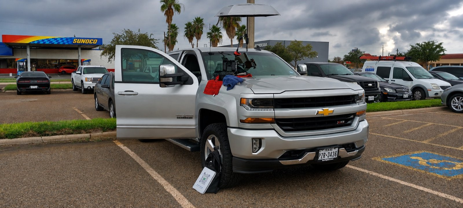 Premier Windshield mobile setup working on a white GMC Yukon in Mission, Texas